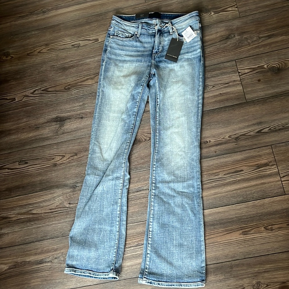 Buckle black universal fit mid-rise bootcut jeans